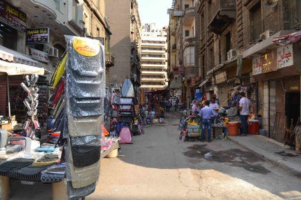 <a class="fancybox" rel="gallery-encroachments-and-territory-markers" href="https://cuipcairo.org/sites/default/files/styles/largest/public/dsc_0182.jpg?itok=visSZZW8" title="The shops spill out their goods in the passageway.">Enlarge</a><br >2015, Oct 11, 02:10pm<br>The shops spill out their goods in the passageway.