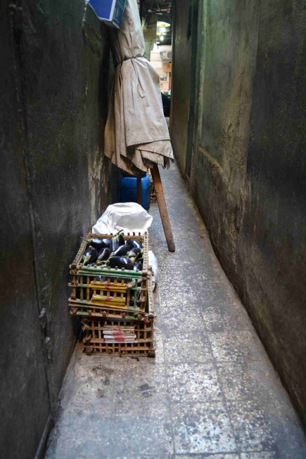<a class="fancybox" rel="gallery-encroachments-and-territory-markers" href="https://cuipcairo.org/sites/default/files/styles/largest/public/dsc_0344_01.jpg?itok=kk8Nezyk" title="Vegetable baskets belonging to the restaurant overlooking al-Falaki Street obstruct smooth circulation and make the passageway even narrower.">Enlarge</a><br >Vegetable baskets belonging to the restaurant overlooking al-Falaki Street obstruct smooth circulation and make the passageway even narrower.