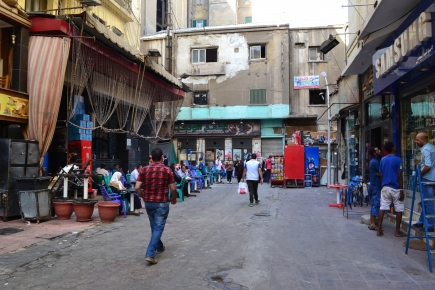 <a class="fancybox" rel="gallery-" href="https://cuipcairo.org/sites/default/files/styles/largest/public/dsc_0436.jpg?itok=_RIb1vmS" title="Overview of the passageway with Funoon coffeehouse on the left.">Enlarge</a><br >2015, Sep 29, 02:09pm<br>Overview of the passageway with Funoon coffeehouse on the left.