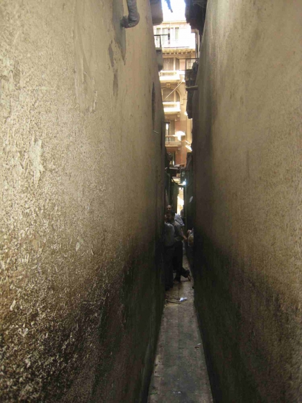 <a class="fancybox" rel="gallery-materials-and-textures" href="https://cuipcairo.org/sites/default/files/styles/largest/public/img_2304_01.jpg?itok=3NmdB_9r" title="The sides of the narrowest part of the passage are smooth and made of concrete.">Enlarge</a><br >The sides of the narrowest part of the passage are smooth and made of concrete.